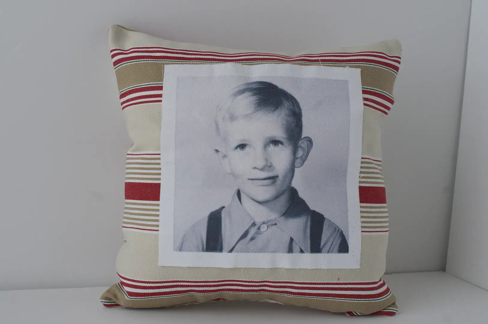 completed vintage photo pillow on white background