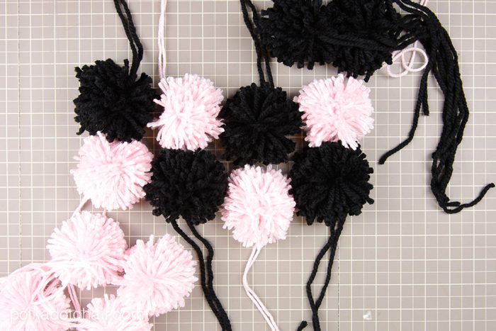 Cute DIY Pom Pom Pillow by Melissa Mortenson of polkadotchair.com