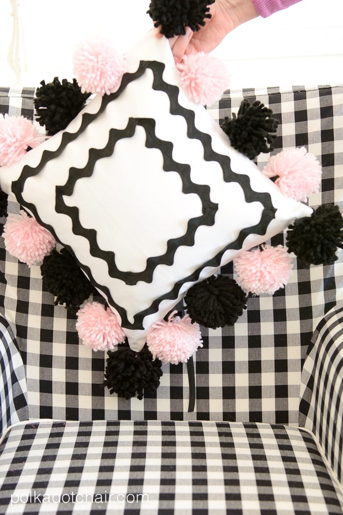 Cute DIY Pom Pom Pillow by Melissa Mortenson of polkadotchair.com