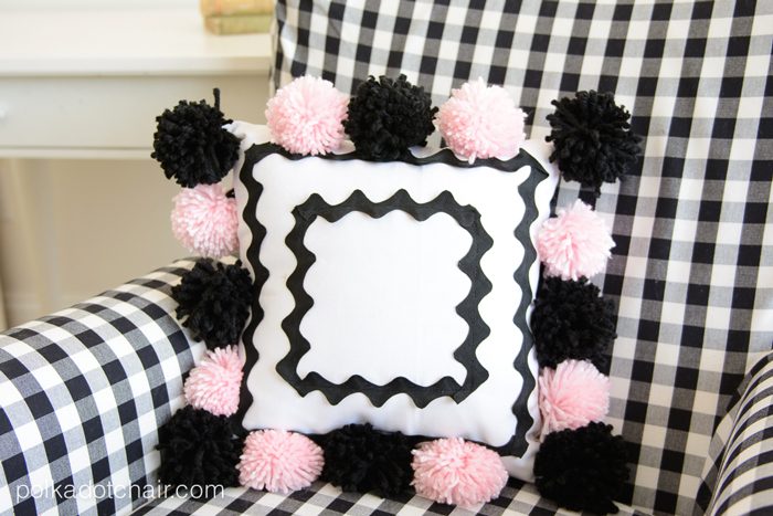 Cute DIY Pom Pom Pillow by Melissa Mortenson of polkadotchair.com