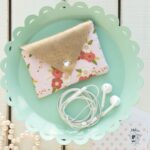 Free Sewing Pattern for a fabric and leather earbuds carrying case, would also be a great business card holder, by polkadotchair.com