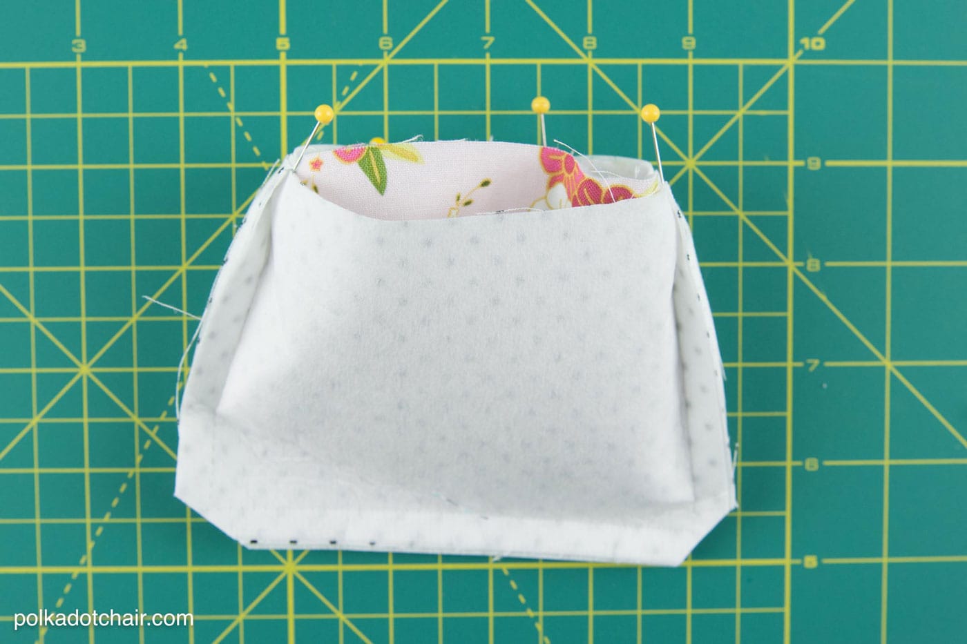 Free Sewing Pattern for a fabric and leather earbuds carrying case, would also be a great business card holder, by polkadotchair.com