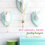 Cute and Whimsical DIY Jewelry Hangers made with wood plaques and animal heads; a creative way to display your jewelry