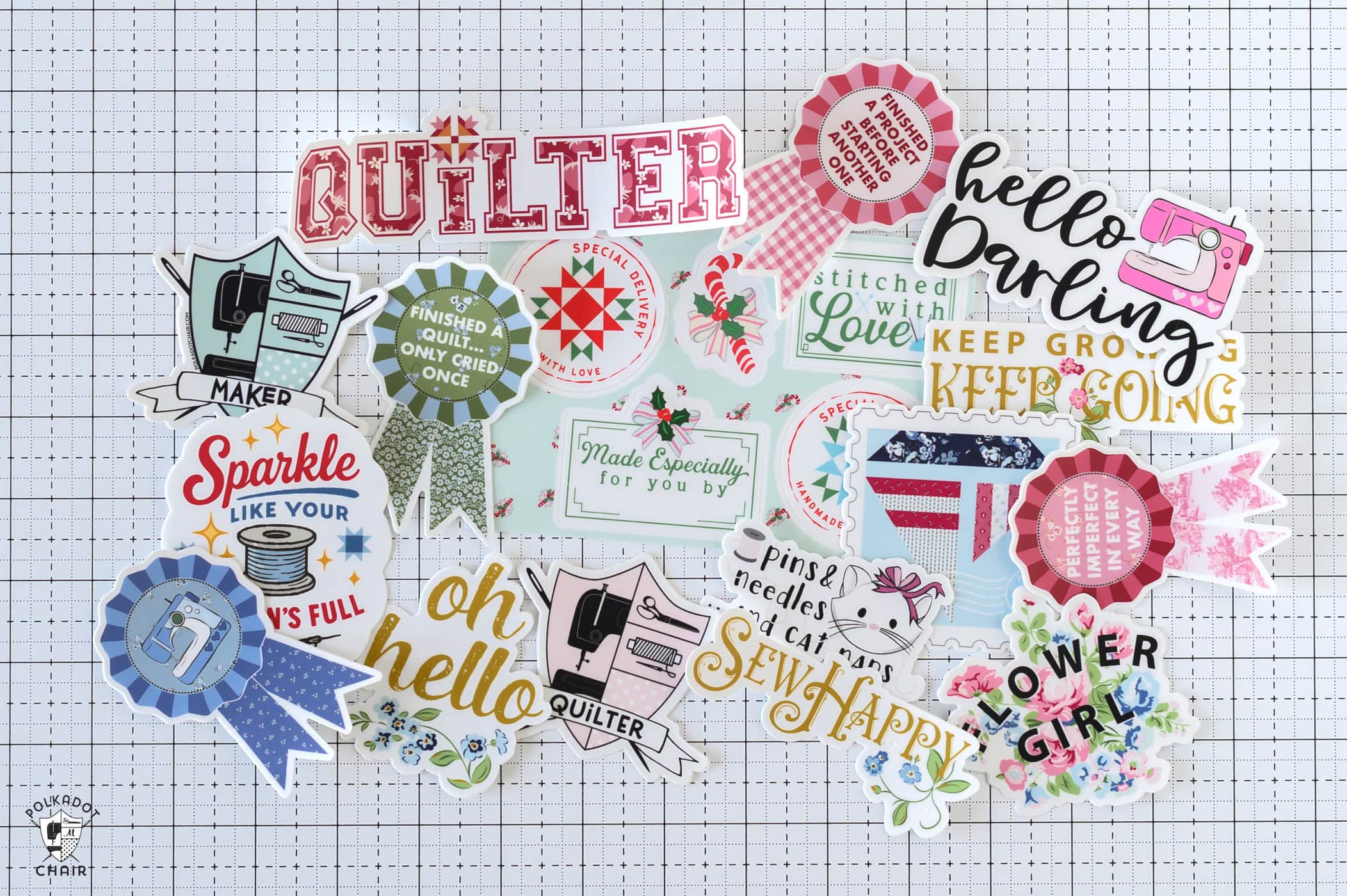 assorted maker stickers on white cutting mat