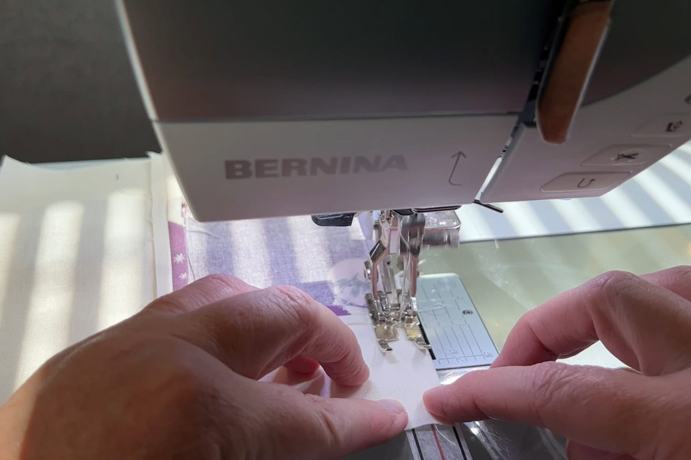 fabric under sewing machine foot