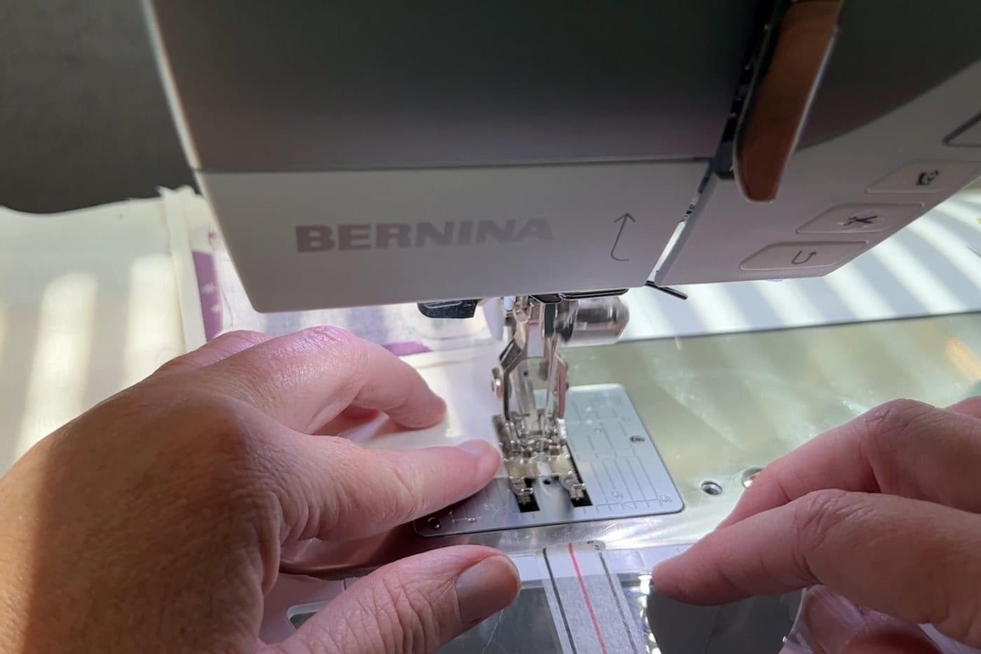 fabric under sewing machine foot