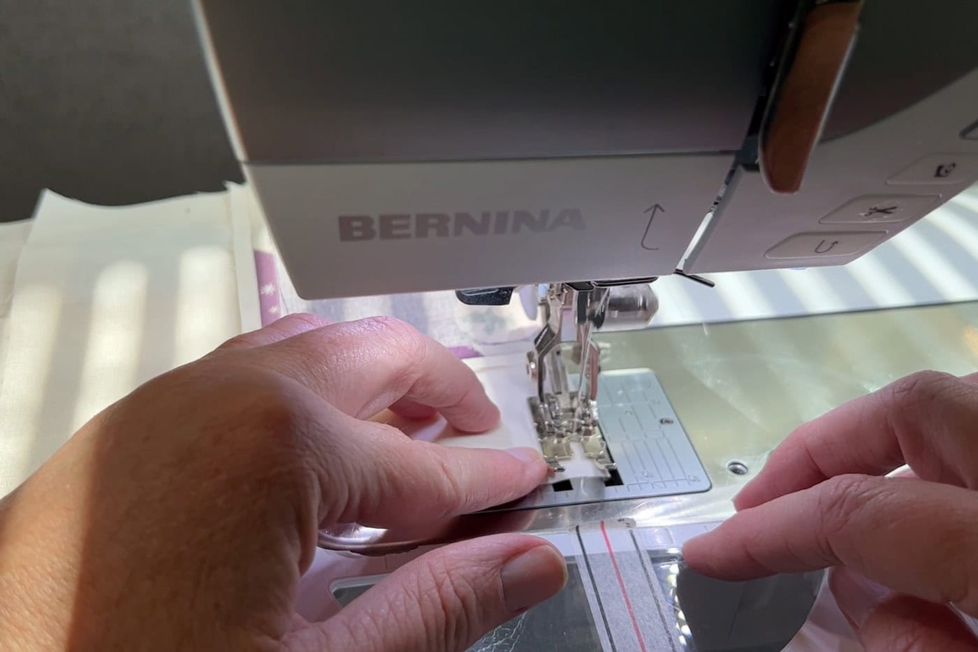 fabric under sewing machine foot