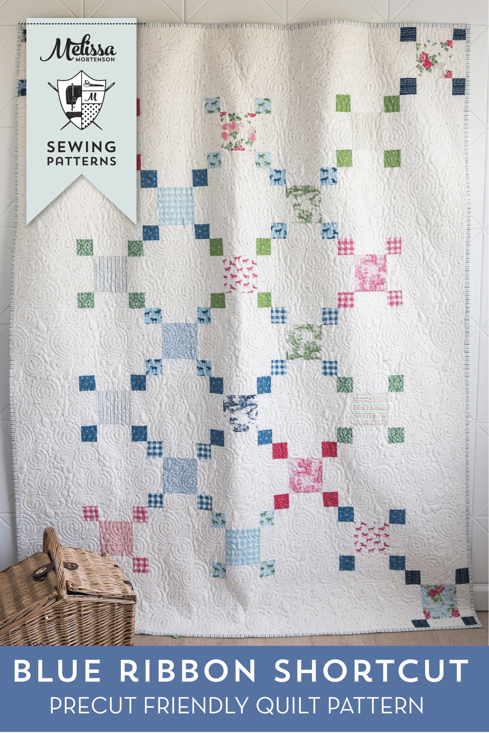 white Irish chain inspired quilt hanging on wall