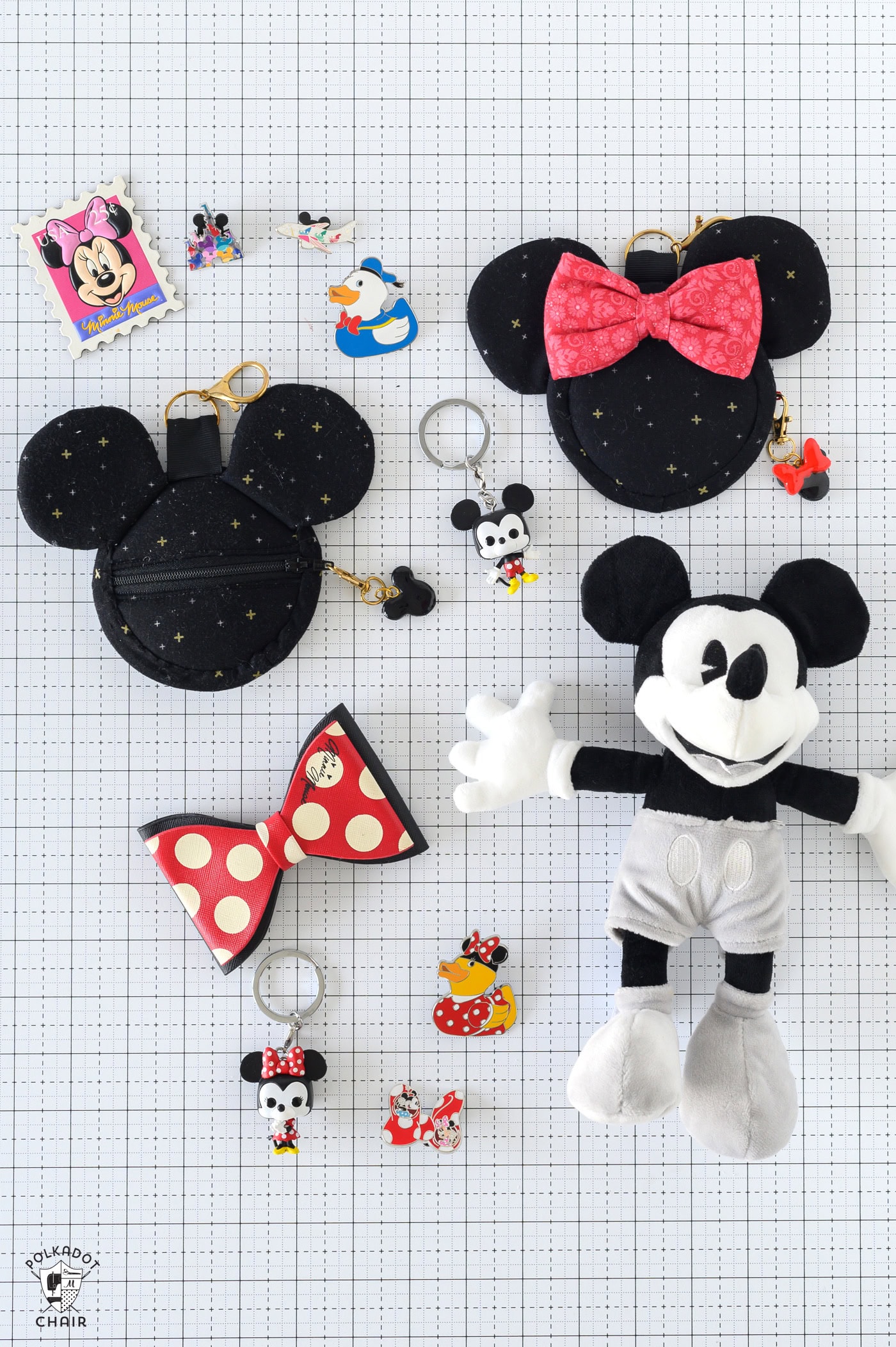 various disney souvenirs on white cutting mat