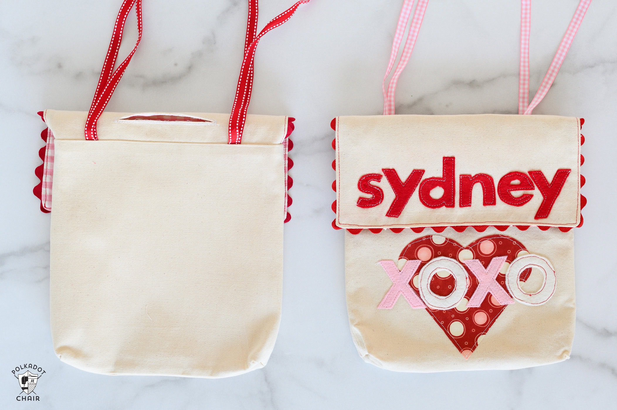 canvas chairbacker on white table. chairbacker has name made from felt and applique heart