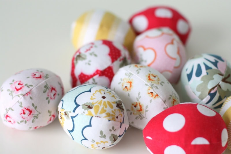 fabric easter eggs in fun colors on white counter