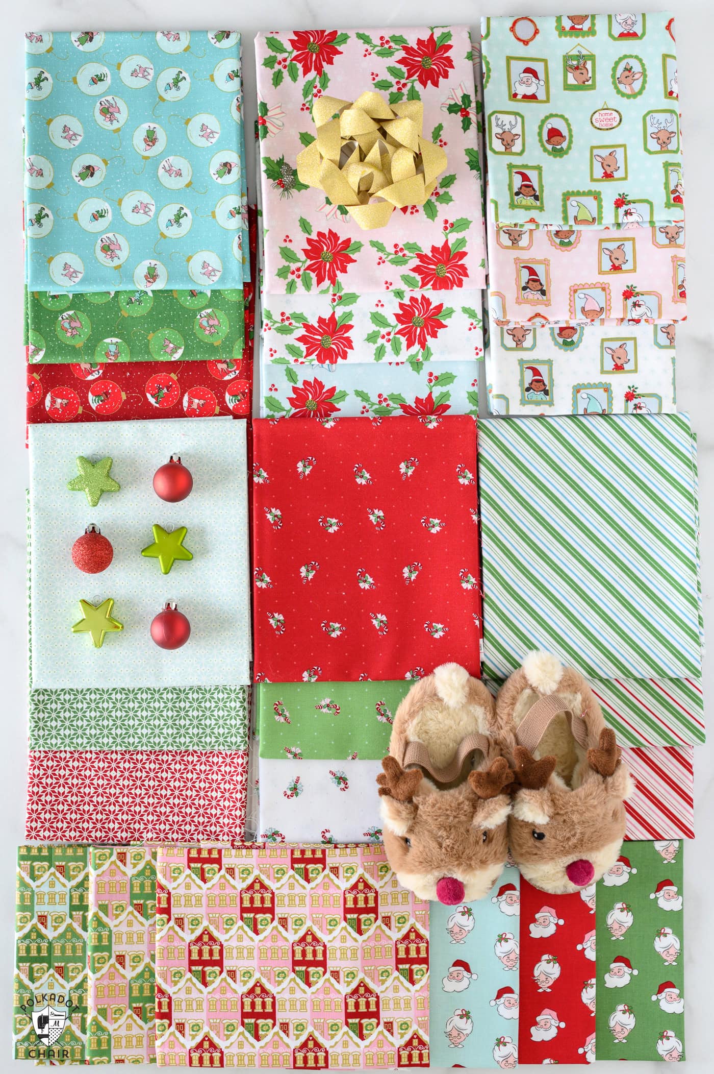 red and pink christmas fabric folded on white table