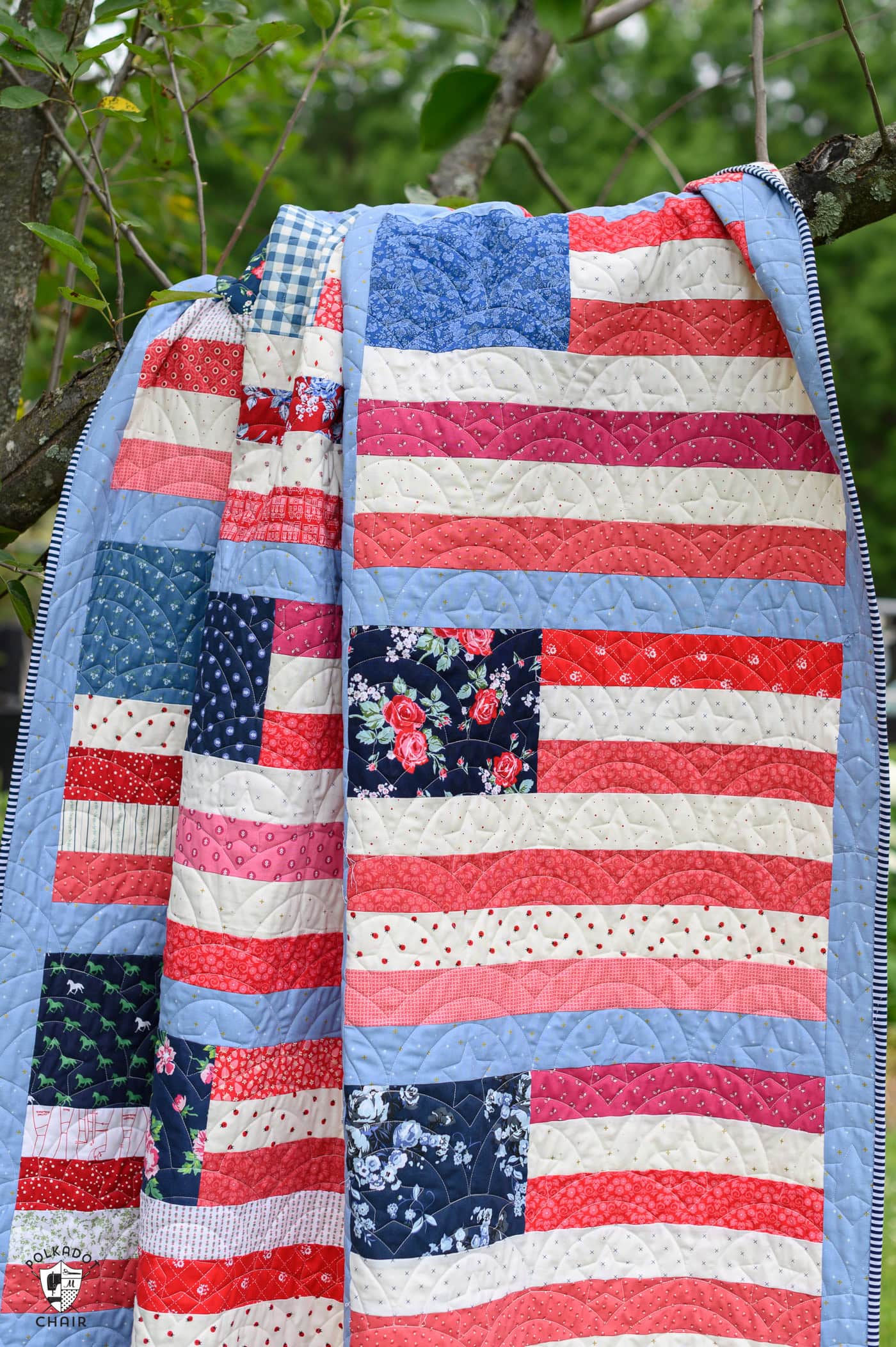 close up of scrappy red white and blue american flag quilt