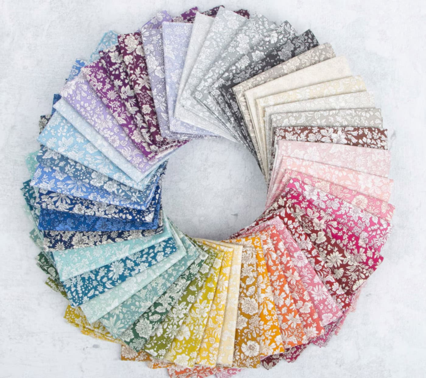 rainbow colors of emily belle fabric on white table