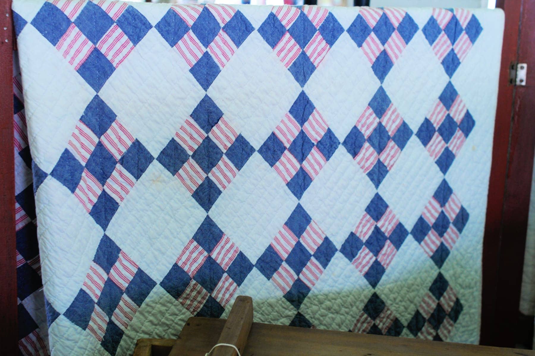 blue and red antique quilt