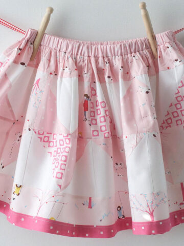 Free Sewing Tutorial to make a little girls patchwork zig zag skirt- uses charm packs- super quick and cute!