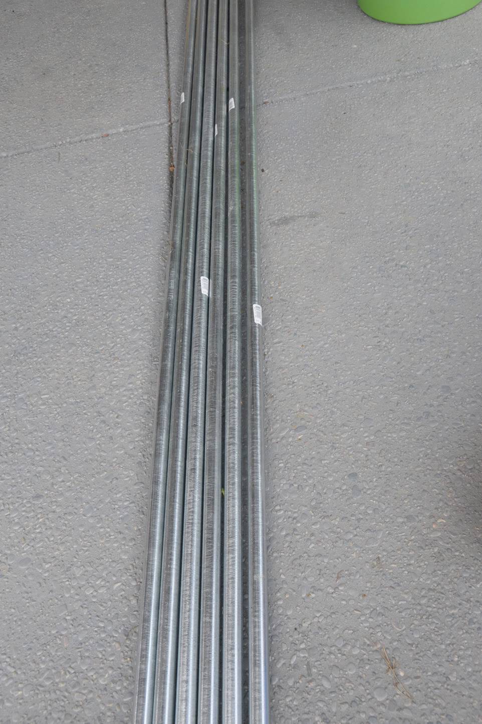 gray metal rods on concrete