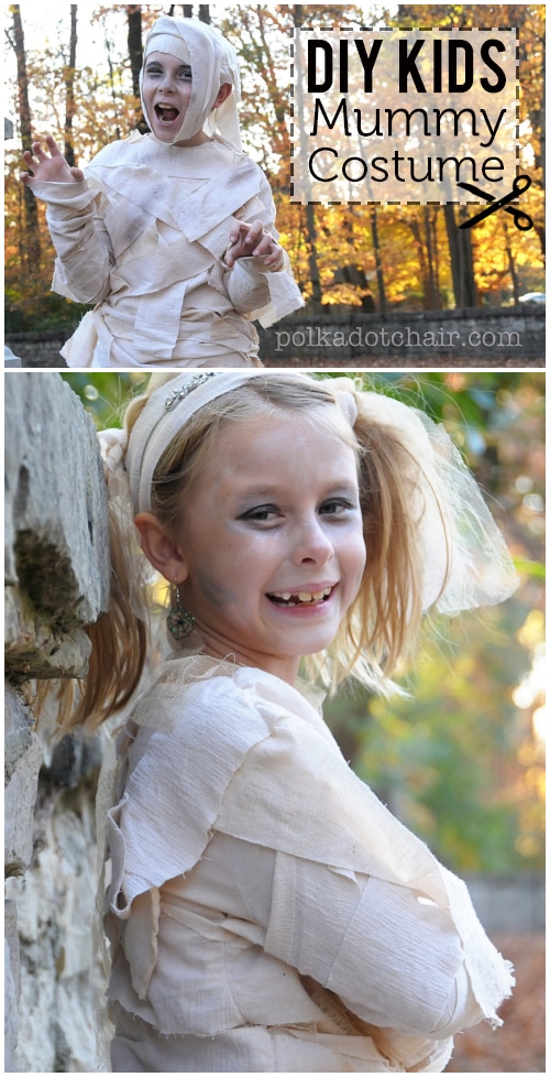 two kids in mummy costumes outdoors in the fall