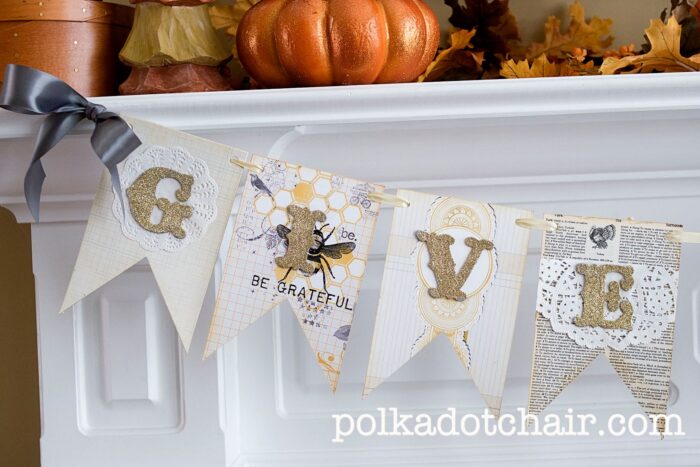 close up of book page banner with gold glitter letters