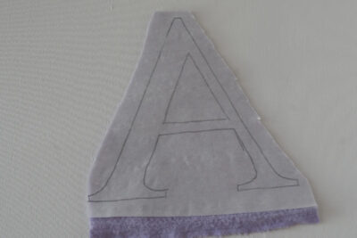 pink and gree fleece blanket under construction