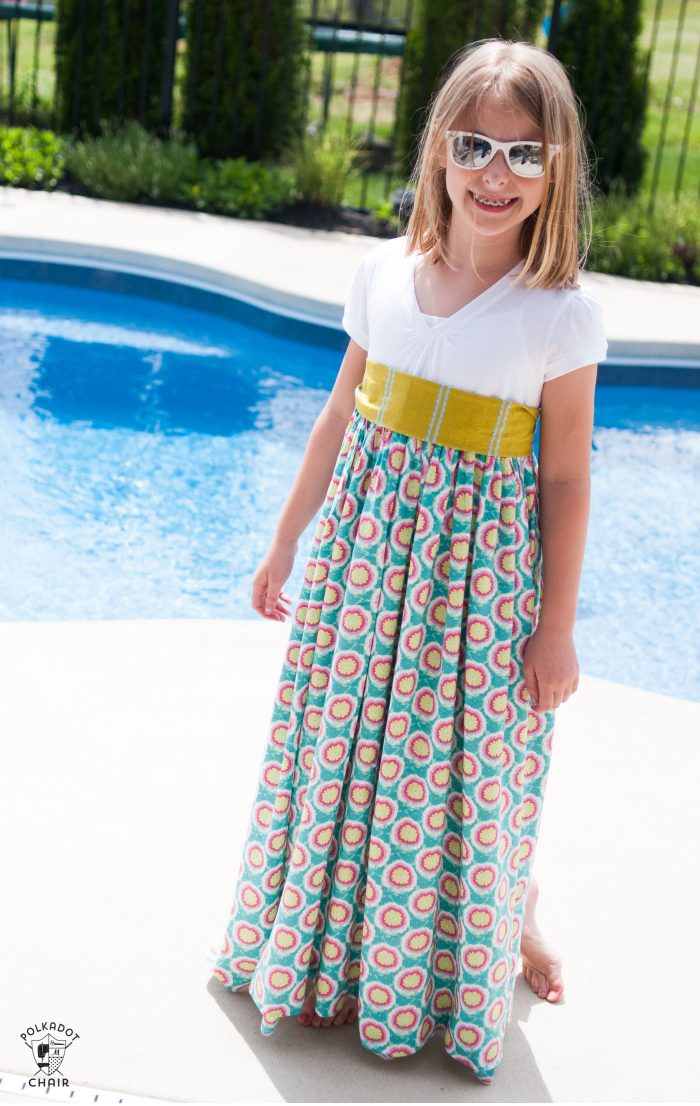 Upcycle a T-shirt into a girls maxi dress with this sewing tutorial. A free pattern for a t-shirt maxi dress on polkadotchair.com