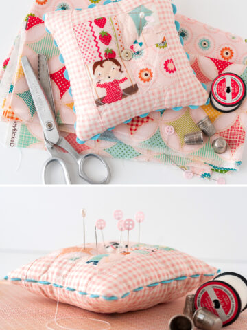 pink patchwork pincushion on gingham paper with sewing notions