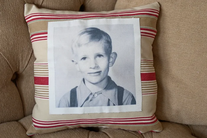 pillow with vintage photo on sofa