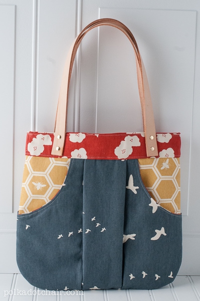 Tote bag with outlet leather straps