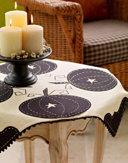 Black and White Halloween Tablecloth on table with fall decorations