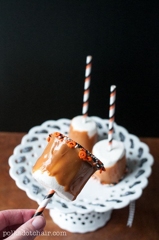 Caramel dipped marshmallows, a cute treat idea for a Halloween party