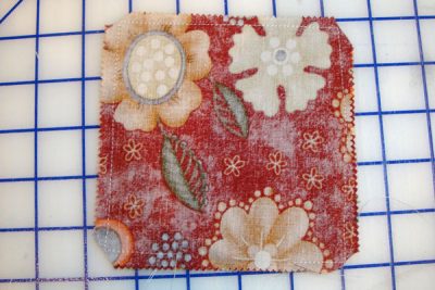 Fabric on white cutting mat