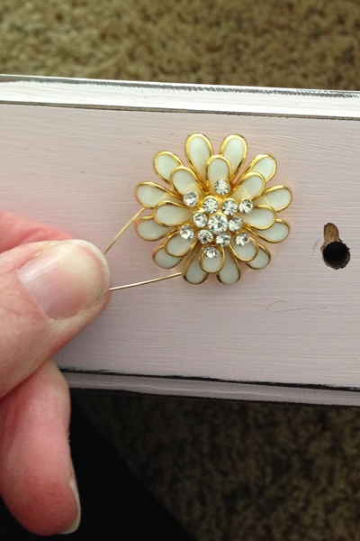 Make your own drawer pulls from buttons