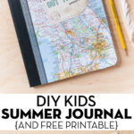 kids composition notebook with map cover on wood table