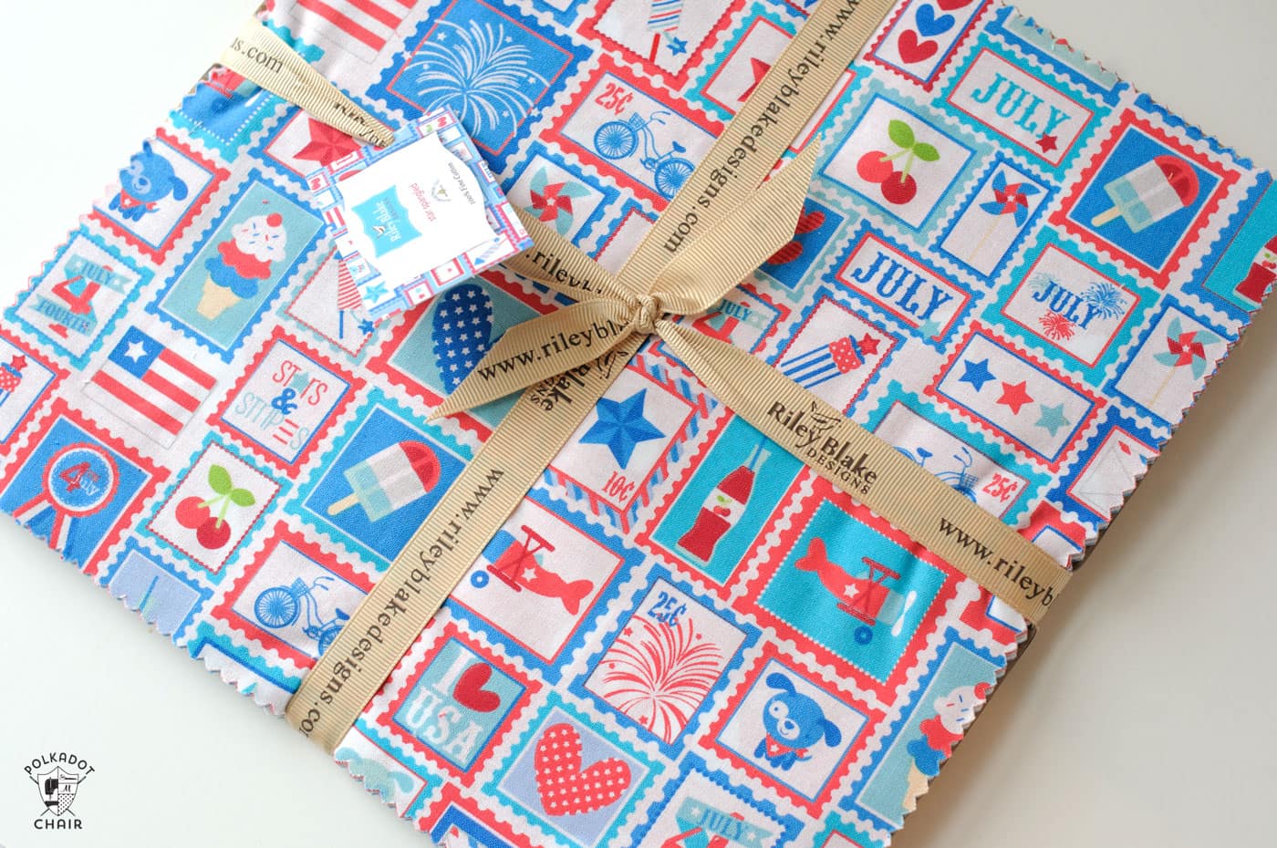 stack of red white and blue fabric on white table