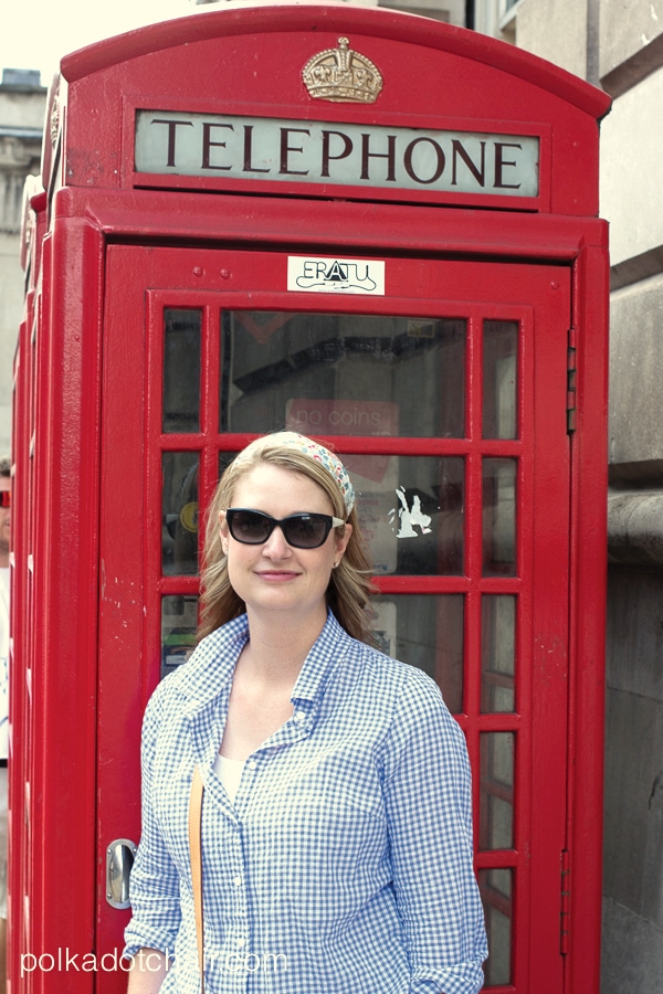 Woman wearing DIY headband in front of red telephone box