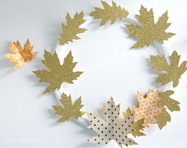 Use die cut paper leaves to create an Autumn wreath