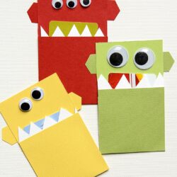 DIY Monster Gift Card Holder, a cute way to give a gift card to a kid for Christmas. Make it yourself at home with only paper.