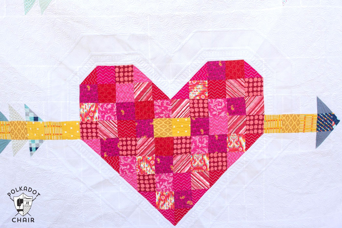 Cupid's Arrow Quilt Pattern, a fun twist on a patchwork heart quilt