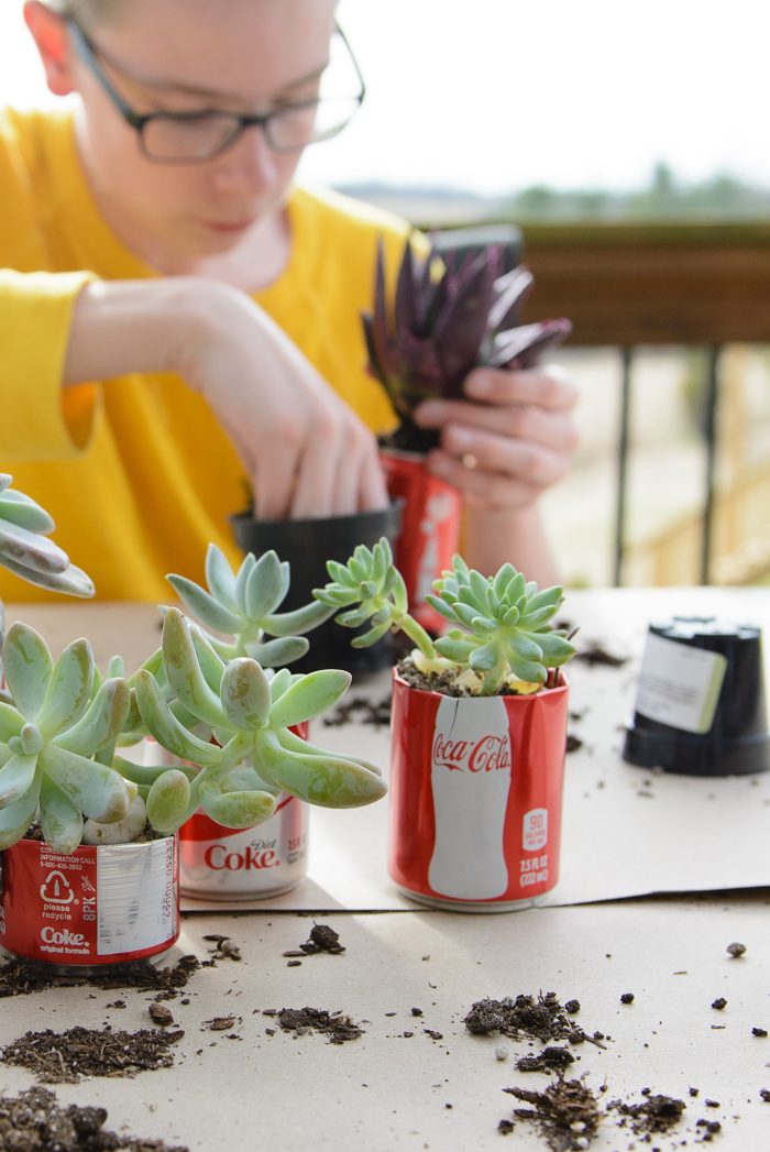 DIY Coke Can Succulent Planter- a clever way to recycle those cute mini coke cans