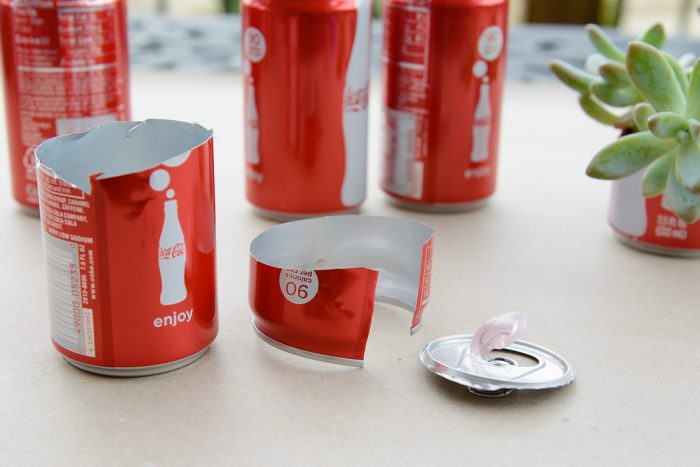 DIY Coke Can Succulent Planter- a clever way to recycle those cute mini coke cans