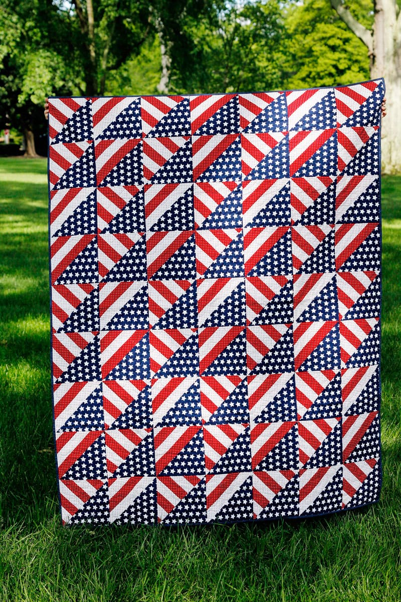 Red stripe and blue star quilt outdoors