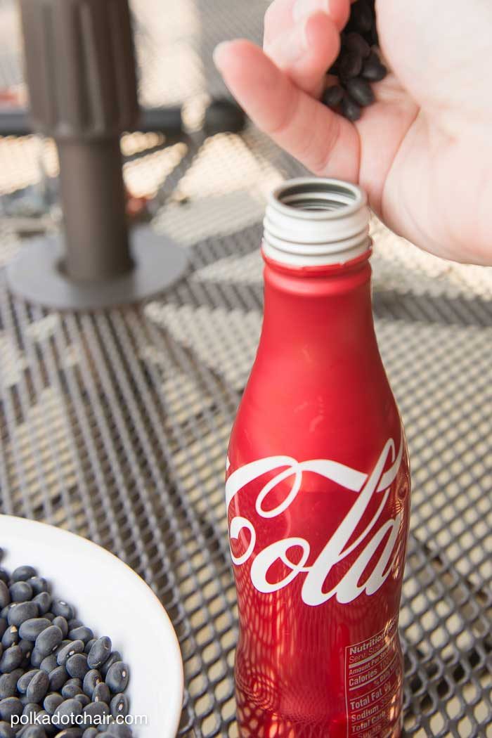 DIY Outdoor Bowling Game, made using Coke bottles, a yoga mat and pool noodles!!