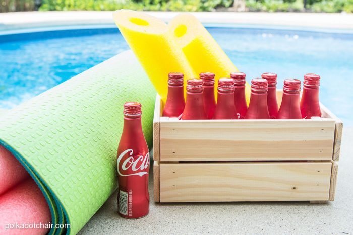 DIY Outdoor Bowling Game, made using Coke bottles, a yoga mat and pool noodles!!