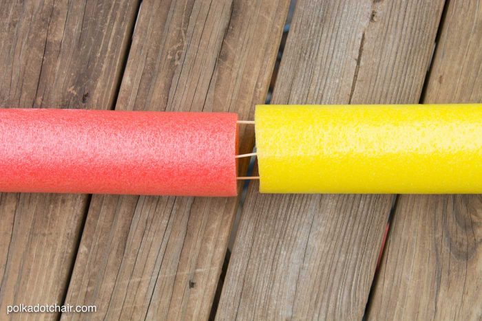 DIY Outdoor Bowling Game, made using Coke bottles, a yoga mat and pool noodles!!