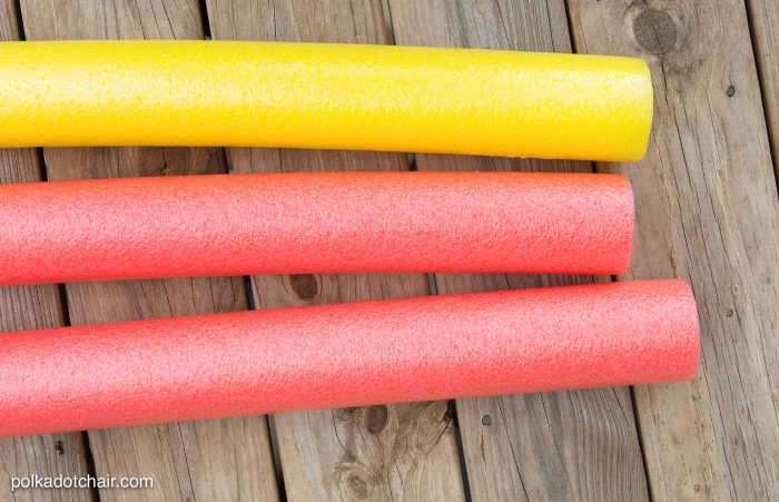 DIY Outdoor Bowling Game, made using Coke bottles, a yoga mat and pool noodles!!