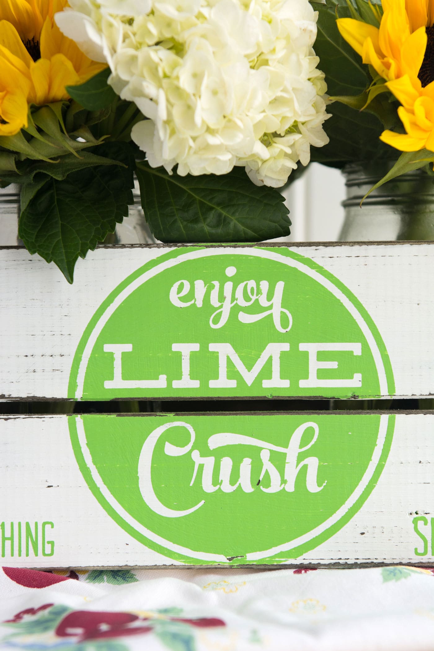 learn how to make your own hand painted vintage soda crate using a stencil. Such a cute project for summer, love the vintage farmhouse style of this crate!