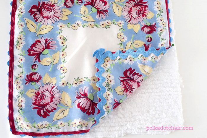 Sewing tutorial showing how to make baby burp cloths from vintage hankies