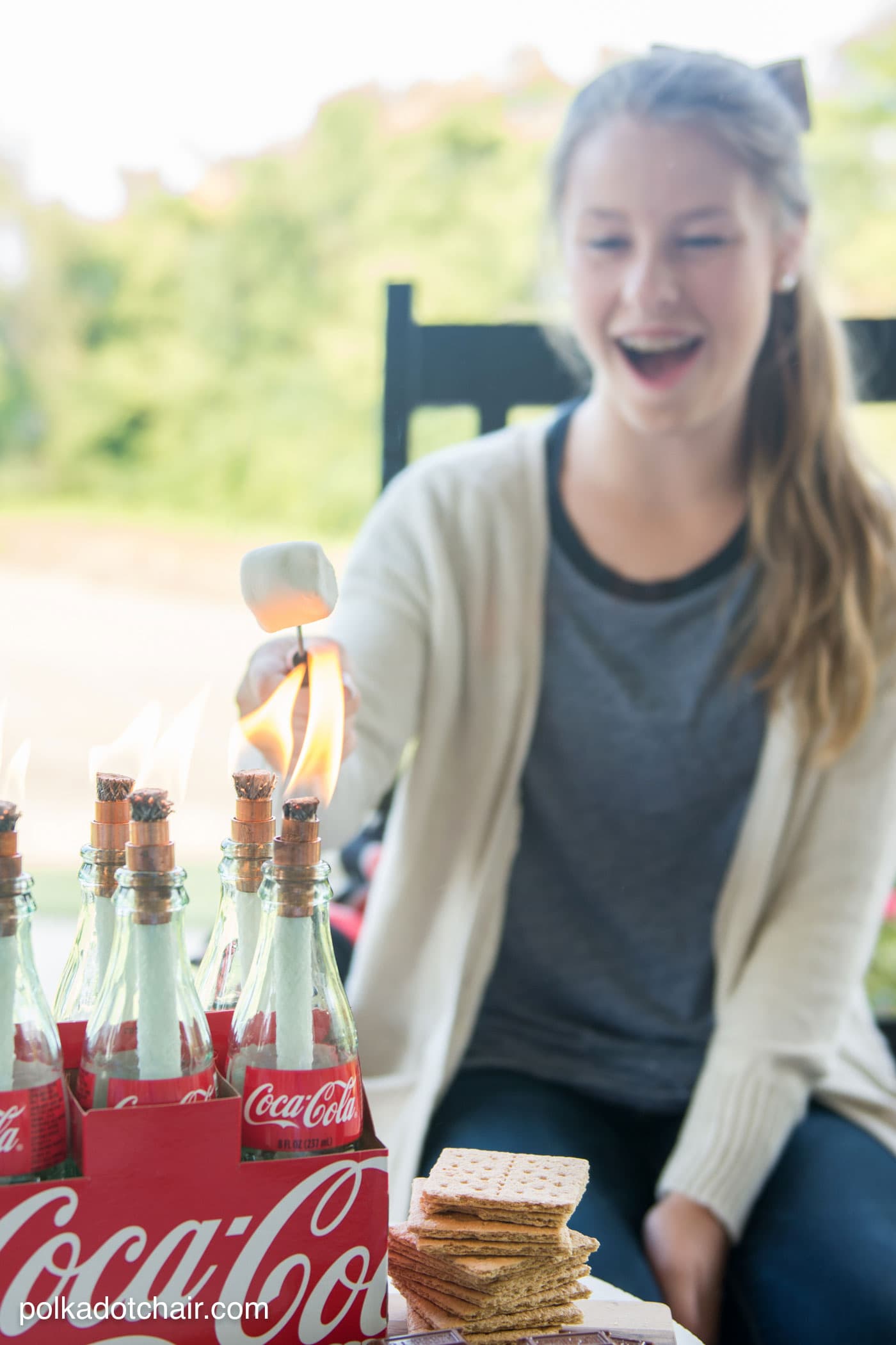 DIY tabletop s'mores maker made from upcycled Coca-Cola bottles