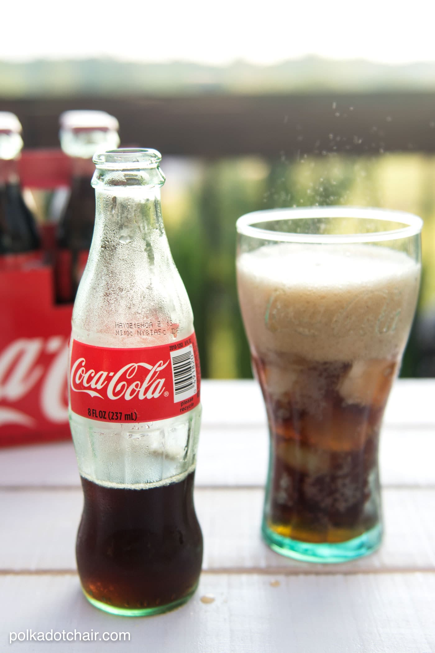 DIY tabletop s'mores maker made from upcycled Coca-Cola bottles