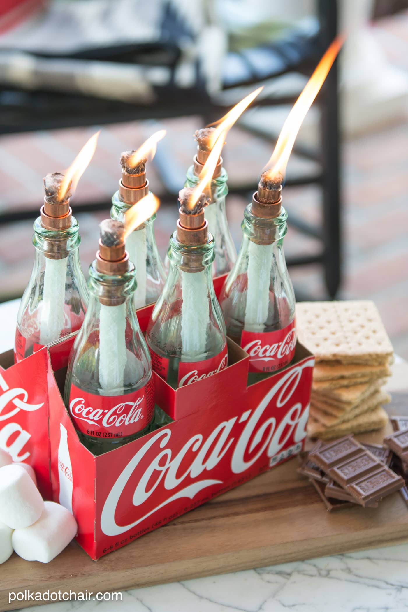 DIY tabletop s'mores maker made from upcycled Coca-Cola bottles